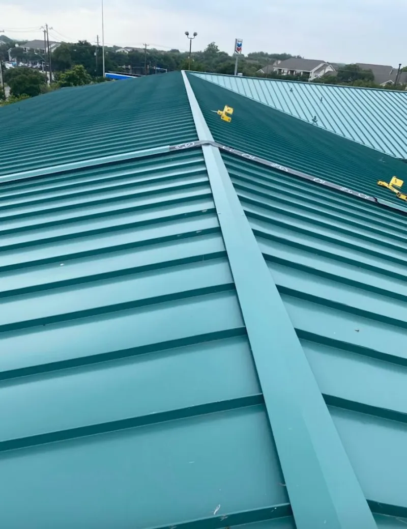 Green commercial metal roof ridge and valley for Metal Roof Repair in Bel Air North